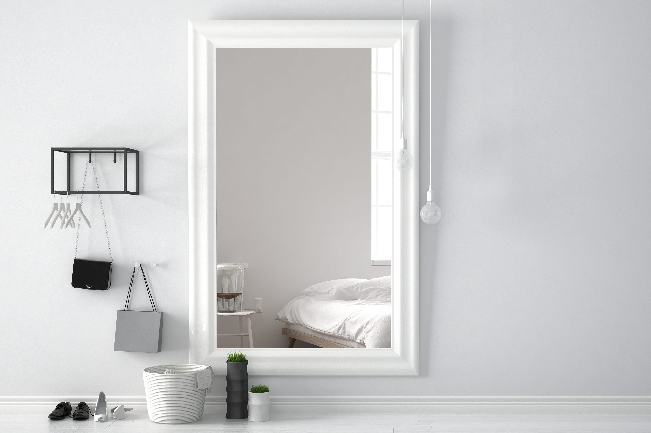 Scandinavian entrance lobby hall with mirror reflecting bright bedroom with bed, chair and table lamp, minimalist white interior design