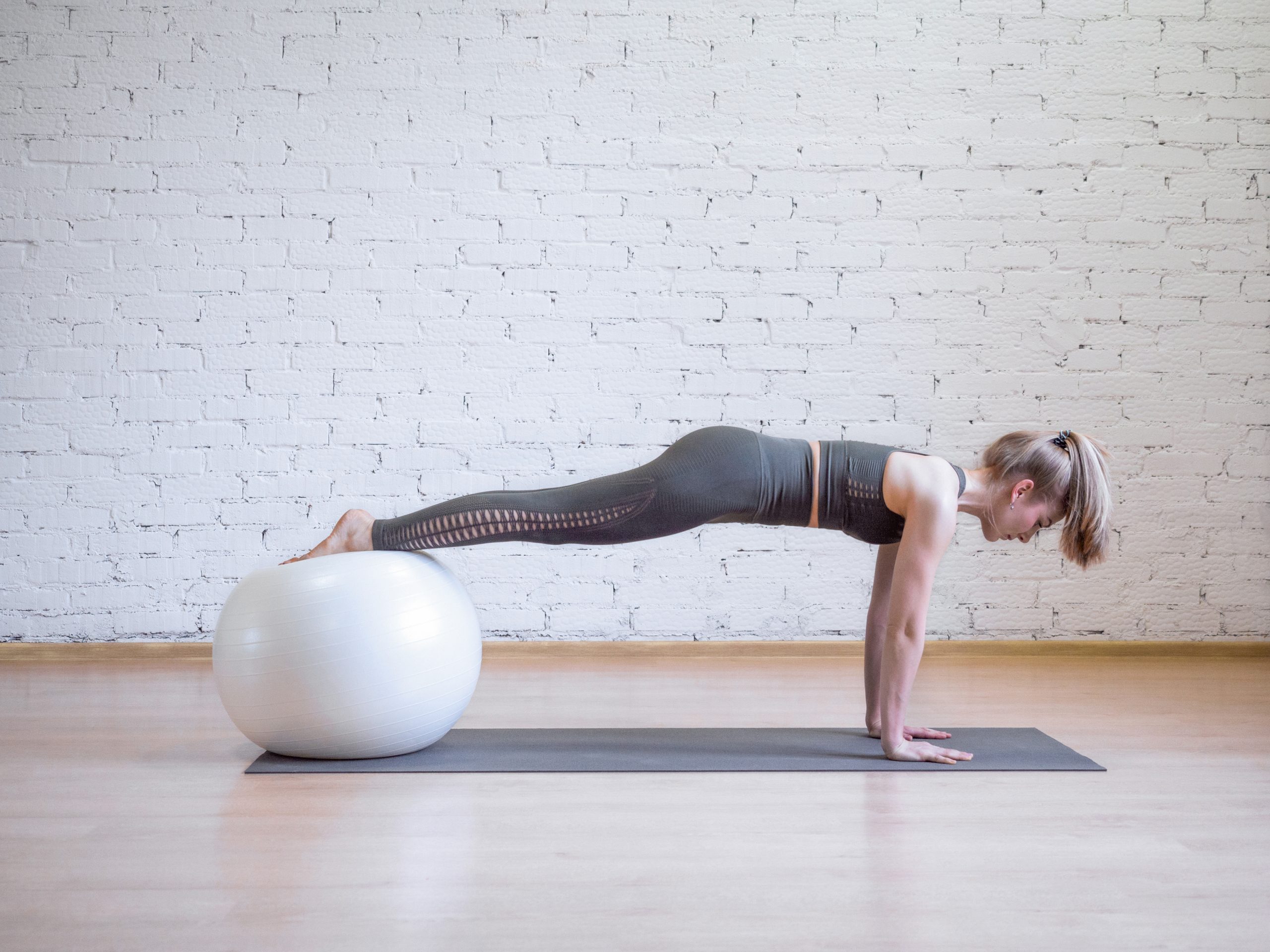 5 Balance Ball Exercises to Improve Stability Best Health Magazine